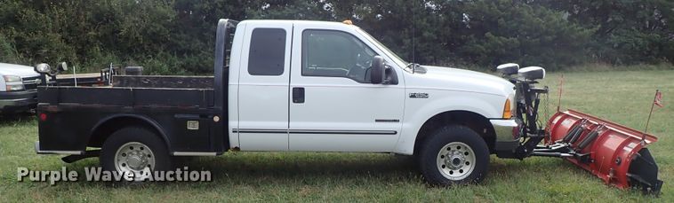 image for item DB7739 1999 Ford F250 Super Duty SuperCab flatbed pickup truck