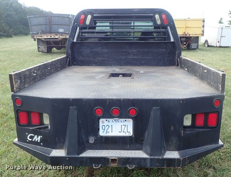 image for item DB7739 1999 Ford F250 Super Duty SuperCab flatbed pickup truck