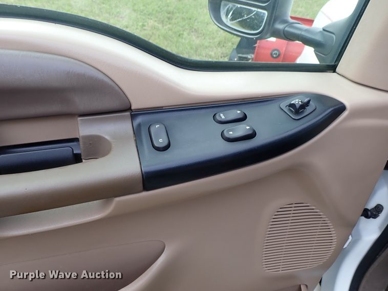 image for item DB7739 1999 Ford F250 Super Duty SuperCab flatbed pickup truck