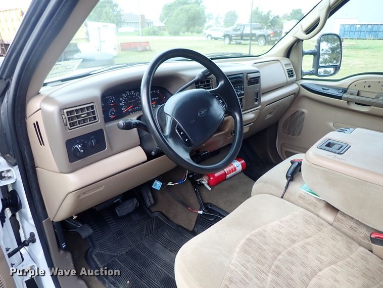 image for item DB7739 1999 Ford F250 Super Duty SuperCab flatbed pickup truck