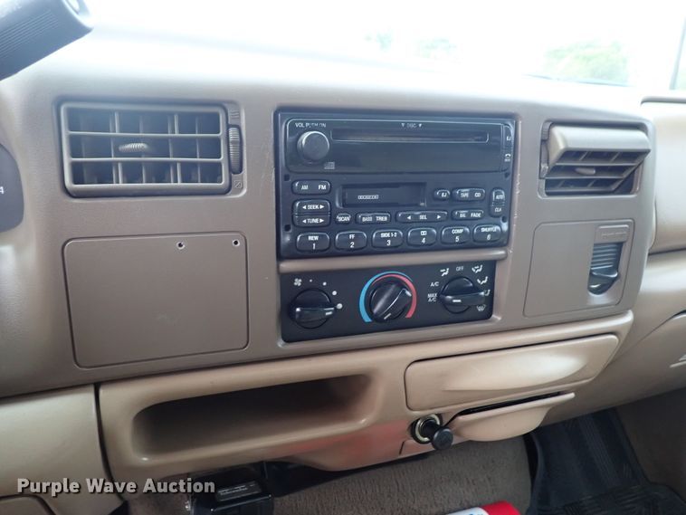 image for item DB7739 1999 Ford F250 Super Duty SuperCab flatbed pickup truck