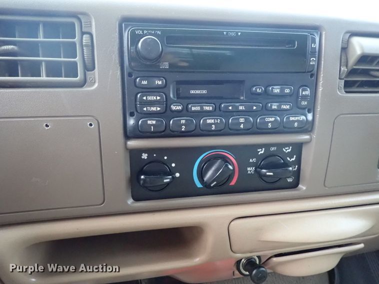 image for item DB7739 1999 Ford F250 Super Duty SuperCab flatbed pickup truck