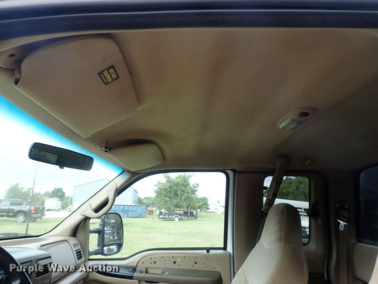 image for item DB7739 1999 Ford F250 Super Duty SuperCab flatbed pickup truck