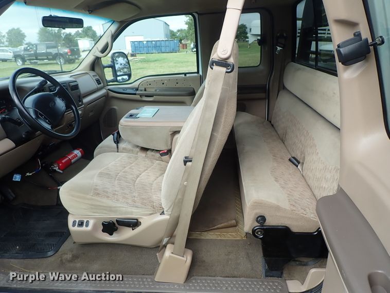 image for item DB7739 1999 Ford F250 Super Duty SuperCab flatbed pickup truck