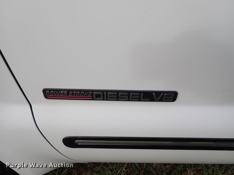 image for item DB7739 1999 Ford F250 Super Duty SuperCab flatbed pickup truck