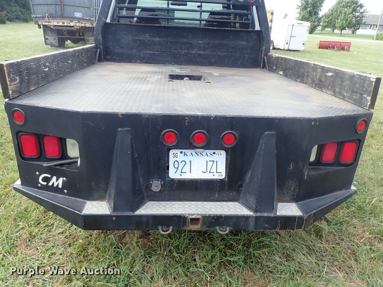 image for item DB7739 1999 Ford F250 Super Duty SuperCab flatbed pickup truck