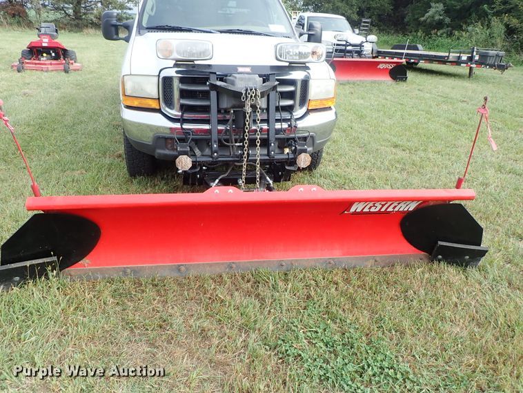image for item DB7739 1999 Ford F250 Super Duty SuperCab flatbed pickup truck