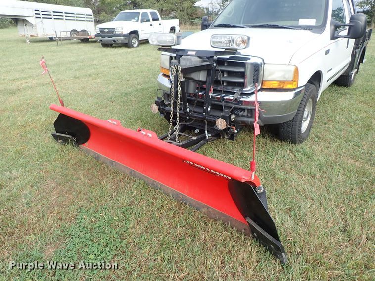 image for item DB7739 1999 Ford F250 Super Duty SuperCab flatbed pickup truck