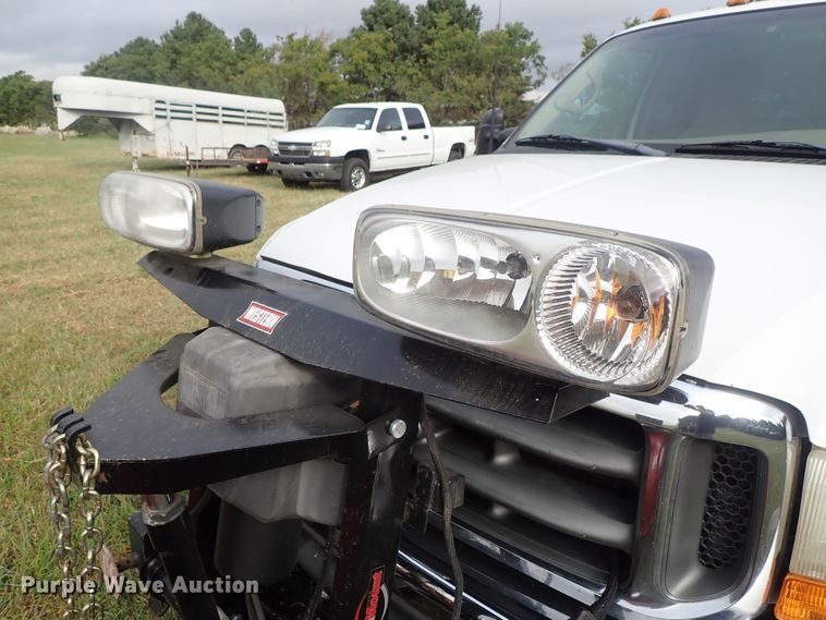 image for item DB7739 1999 Ford F250 Super Duty SuperCab flatbed pickup truck