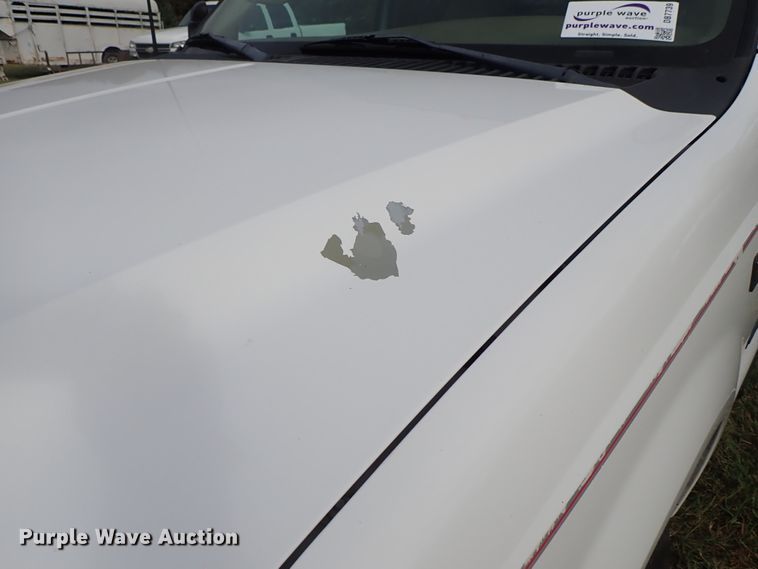 image for item DB7739 1999 Ford F250 Super Duty SuperCab flatbed pickup truck