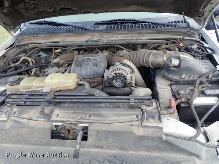 image for item DB7739 1999 Ford F250 Super Duty SuperCab flatbed pickup truck