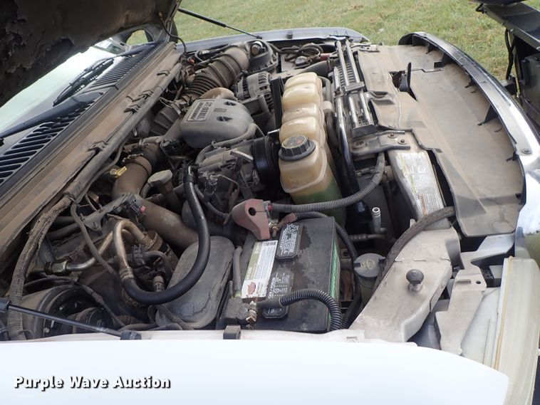 image for item DB7739 1999 Ford F250 Super Duty SuperCab flatbed pickup truck