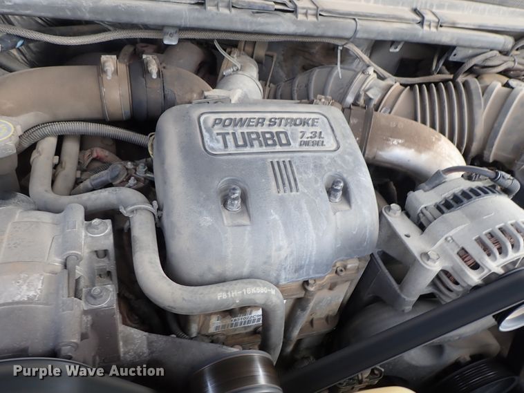 image for item DB7739 1999 Ford F250 Super Duty SuperCab flatbed pickup truck