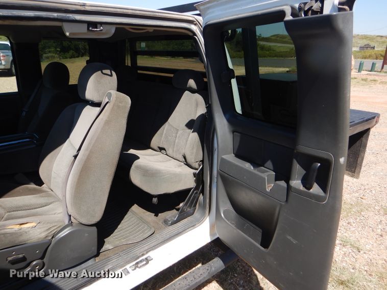 image for item DD4452 2005 Chevrolet Silverado 2500HD Ext. Cab flatbed pickup truck