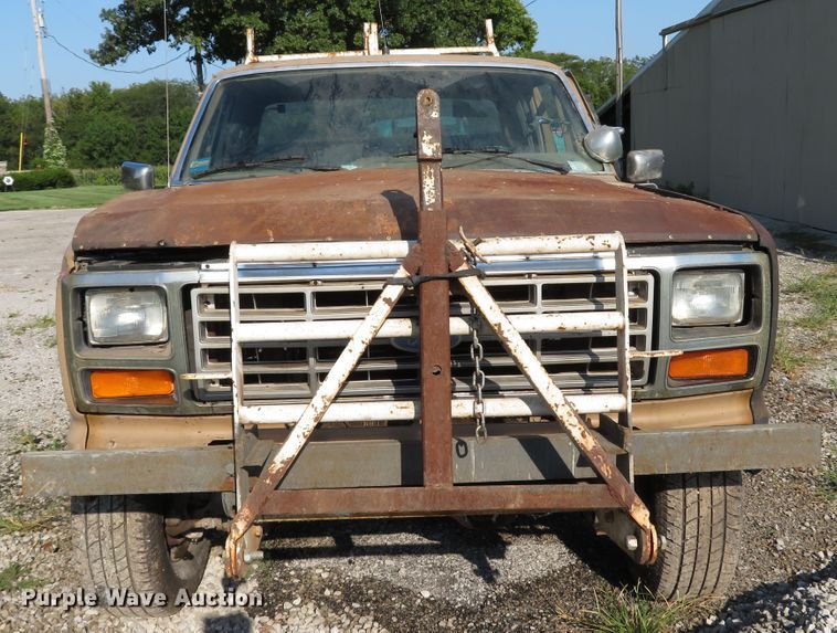 image for item DH1557 1984 Ford F250 Ext. Cab utility bed pickup truck