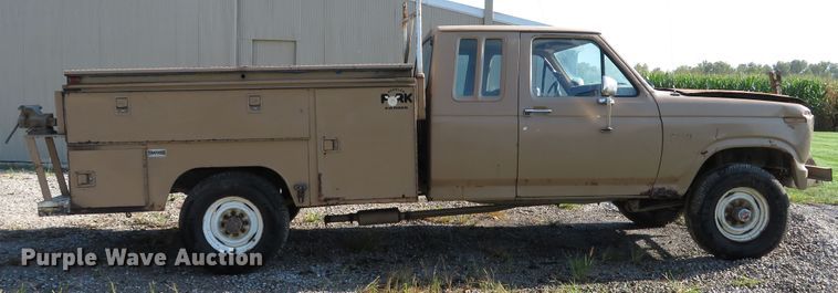 image for item DH1557 1984 Ford F250 Ext. Cab utility bed pickup truck