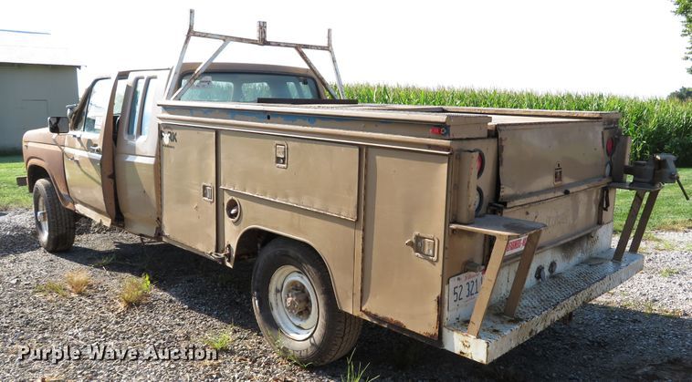 image for item DH1557 1984 Ford F250 Ext. Cab utility bed pickup truck