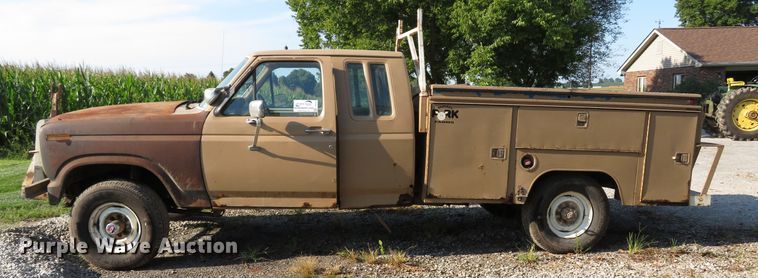 image for item DH1557 1984 Ford F250 Ext. Cab utility bed pickup truck