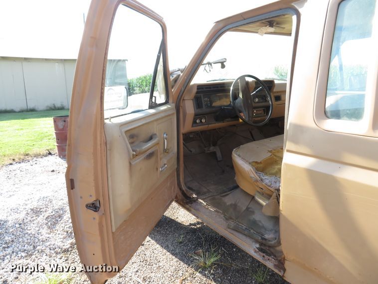 image for item DH1557 1984 Ford F250 Ext. Cab utility bed pickup truck