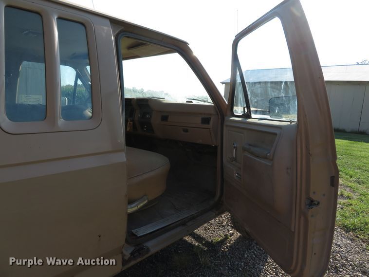 image for item DH1557 1984 Ford F250 Ext. Cab utility bed pickup truck