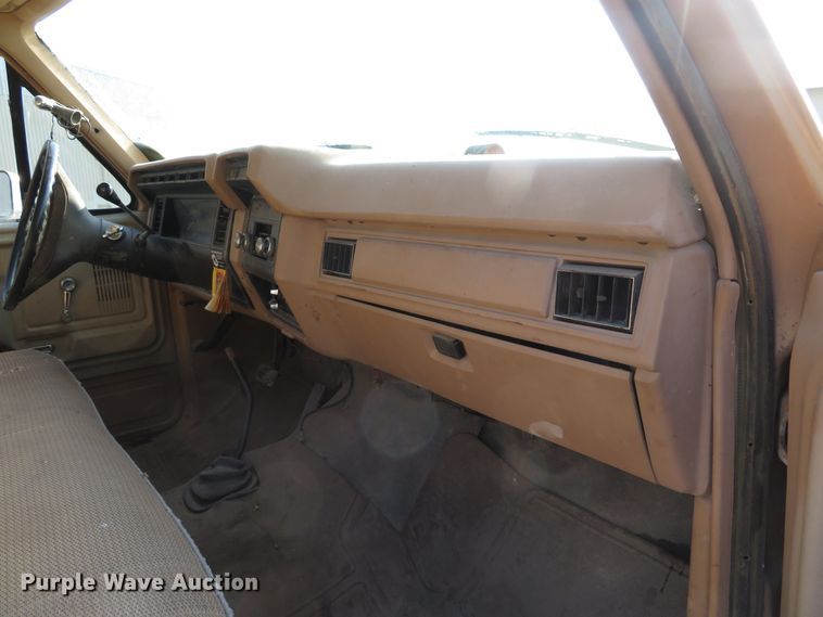 image for item DH1557 1984 Ford F250 Ext. Cab utility bed pickup truck