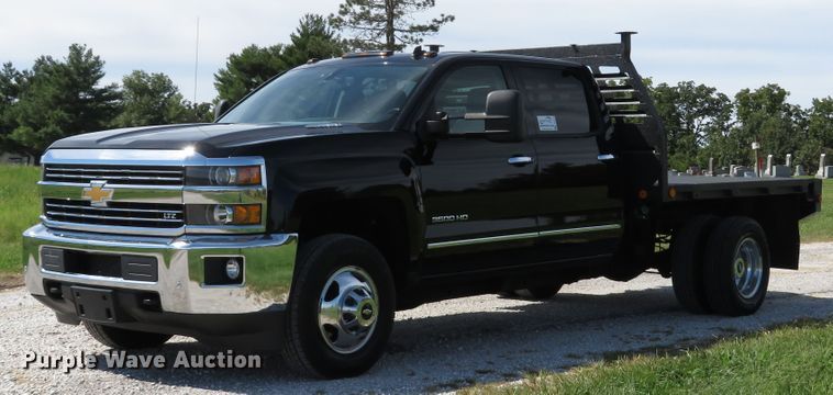 image for item DH1570 2015 Chevrolet Silverado 3500HD LTZ Crew Cab flatbed pickup truck