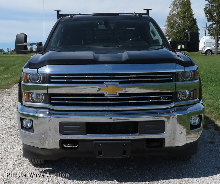image for item DH1570 2015 Chevrolet Silverado 3500HD LTZ Crew Cab flatbed pickup truck