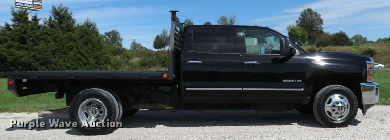 image for item DH1570 2015 Chevrolet Silverado 3500HD LTZ Crew Cab flatbed pickup truck