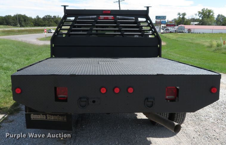 image for item DH1570 2015 Chevrolet Silverado 3500HD LTZ Crew Cab flatbed pickup truck