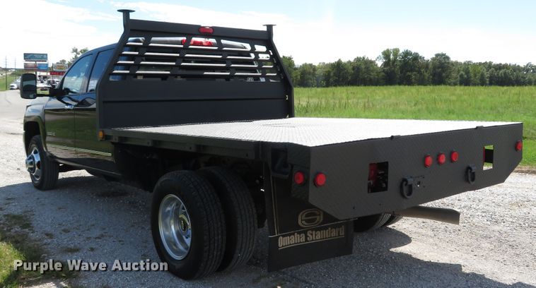 image for item DH1570 2015 Chevrolet Silverado 3500HD LTZ Crew Cab flatbed pickup truck