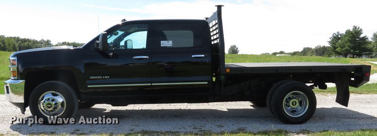 image for item DH1570 2015 Chevrolet Silverado 3500HD LTZ Crew Cab flatbed pickup truck
