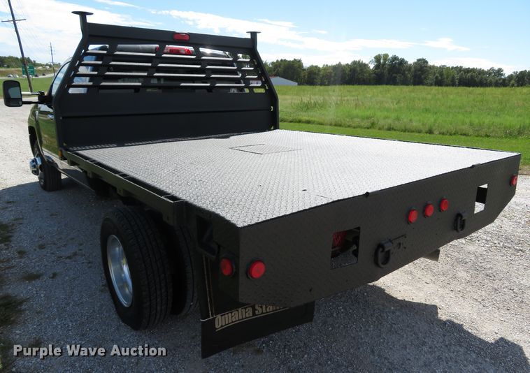 image for item DH1570 2015 Chevrolet Silverado 3500HD LTZ Crew Cab flatbed pickup truck