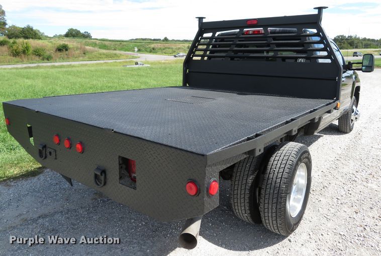 image for item DH1570 2015 Chevrolet Silverado 3500HD LTZ Crew Cab flatbed pickup truck