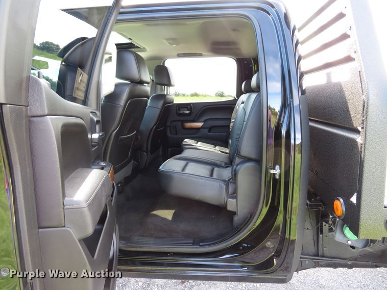 image for item DH1570 2015 Chevrolet Silverado 3500HD LTZ Crew Cab flatbed pickup truck