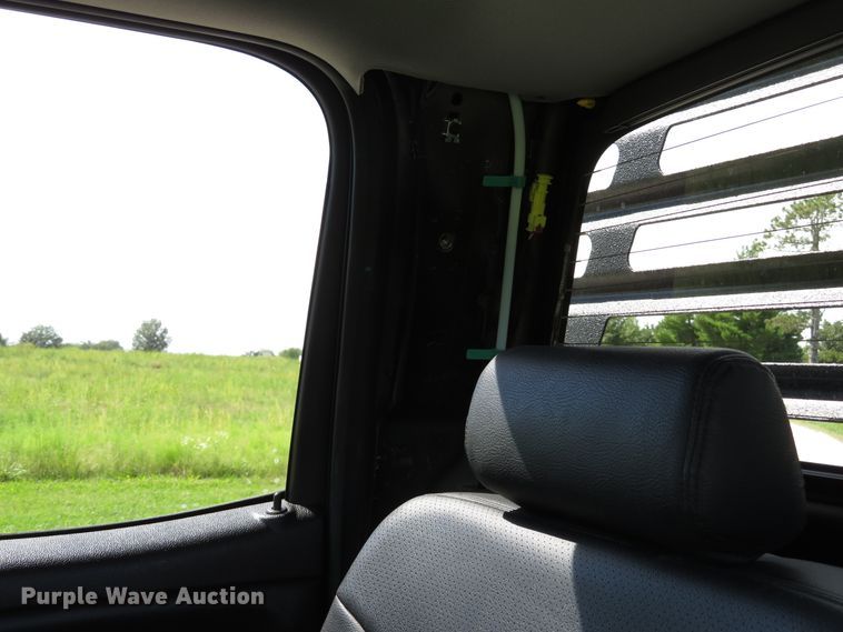 image for item DH1570 2015 Chevrolet Silverado 3500HD LTZ Crew Cab flatbed pickup truck