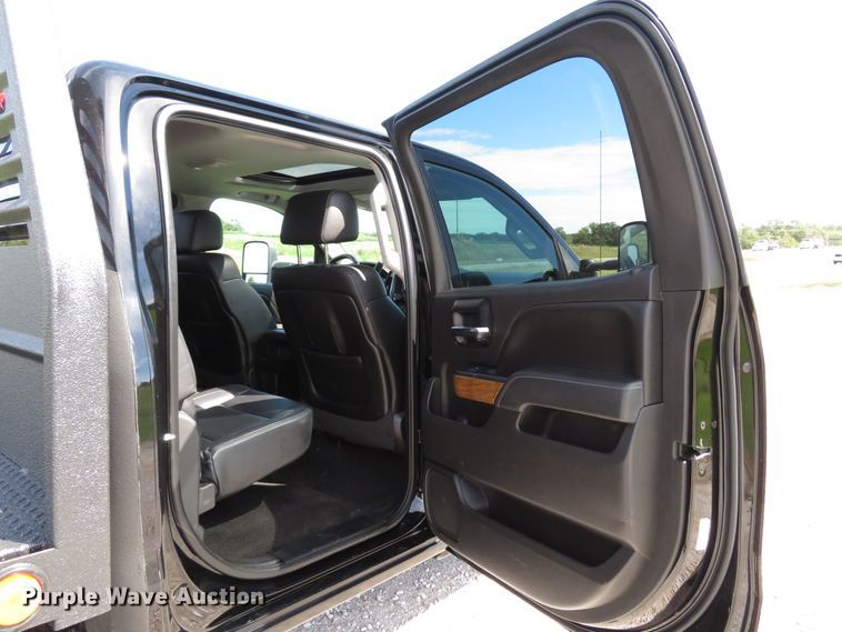 image for item DH1570 2015 Chevrolet Silverado 3500HD LTZ Crew Cab flatbed pickup truck