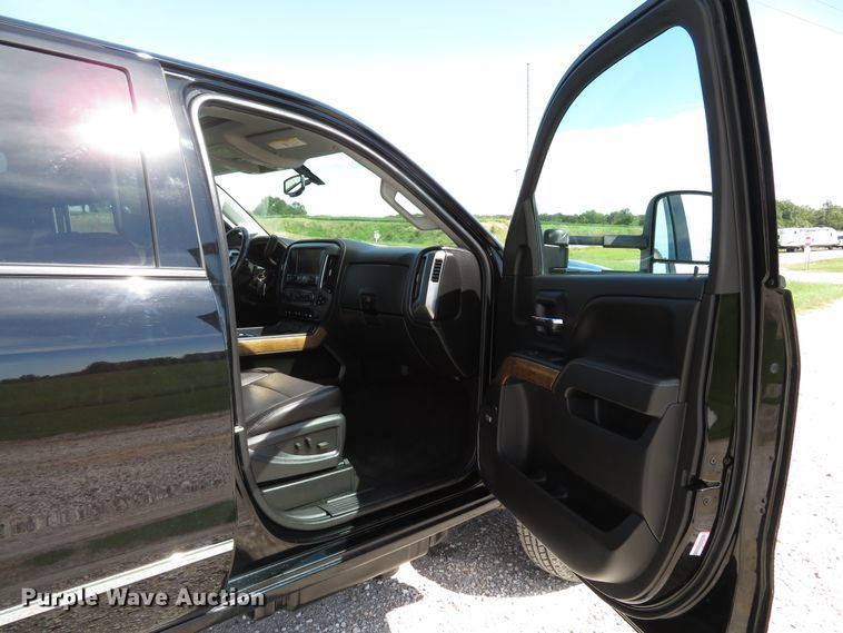 image for item DH1570 2015 Chevrolet Silverado 3500HD LTZ Crew Cab flatbed pickup truck