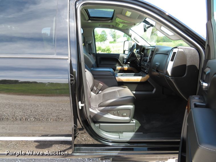 image for item DH1570 2015 Chevrolet Silverado 3500HD LTZ Crew Cab flatbed pickup truck