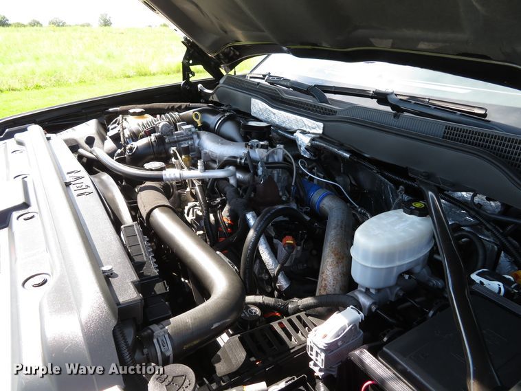 image for item DH1570 2015 Chevrolet Silverado 3500HD LTZ Crew Cab flatbed pickup truck