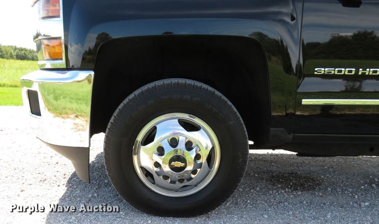 image for item DH1570 2015 Chevrolet Silverado 3500HD LTZ Crew Cab flatbed pickup truck