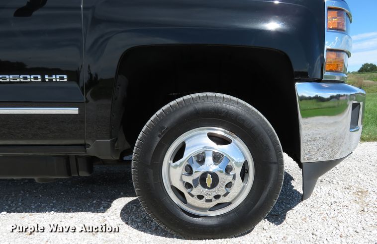 image for item DH1570 2015 Chevrolet Silverado 3500HD LTZ Crew Cab flatbed pickup truck