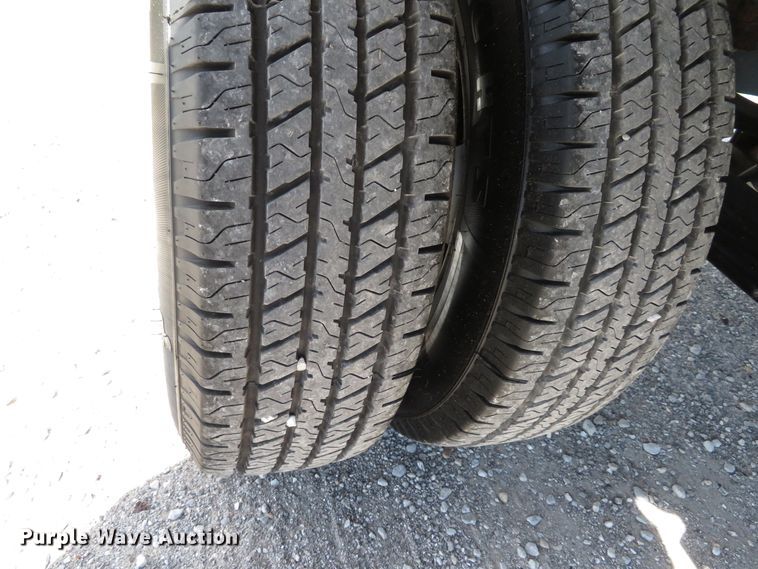 image for item DH1570 2015 Chevrolet Silverado 3500HD LTZ Crew Cab flatbed pickup truck