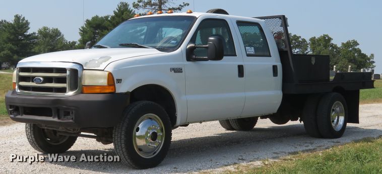 image for item DH1588 1999 Ford F550 Super Duty Crew Cab flatbed truck