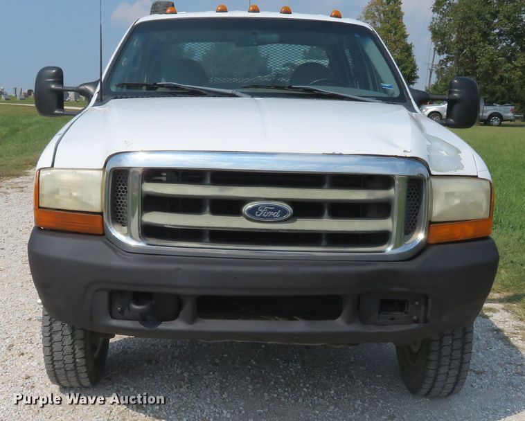 image for item DH1588 1999 Ford F550 Super Duty Crew Cab flatbed truck