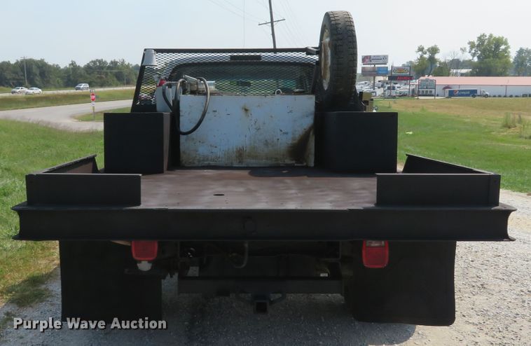 image for item DH1588 1999 Ford F550 Super Duty Crew Cab flatbed truck