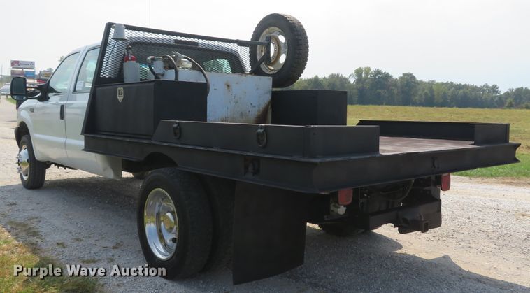 image for item DH1588 1999 Ford F550 Super Duty Crew Cab flatbed truck