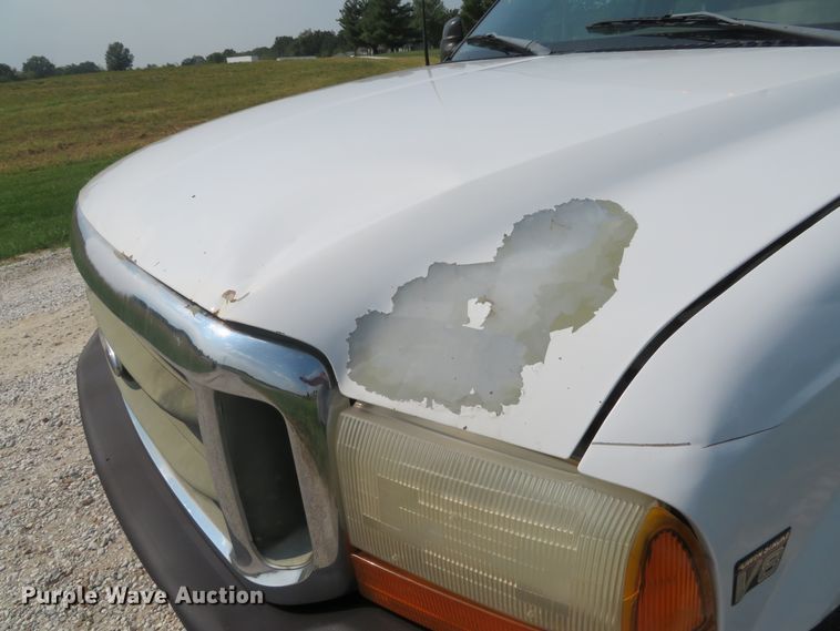 image for item DH1588 1999 Ford F550 Super Duty Crew Cab flatbed truck