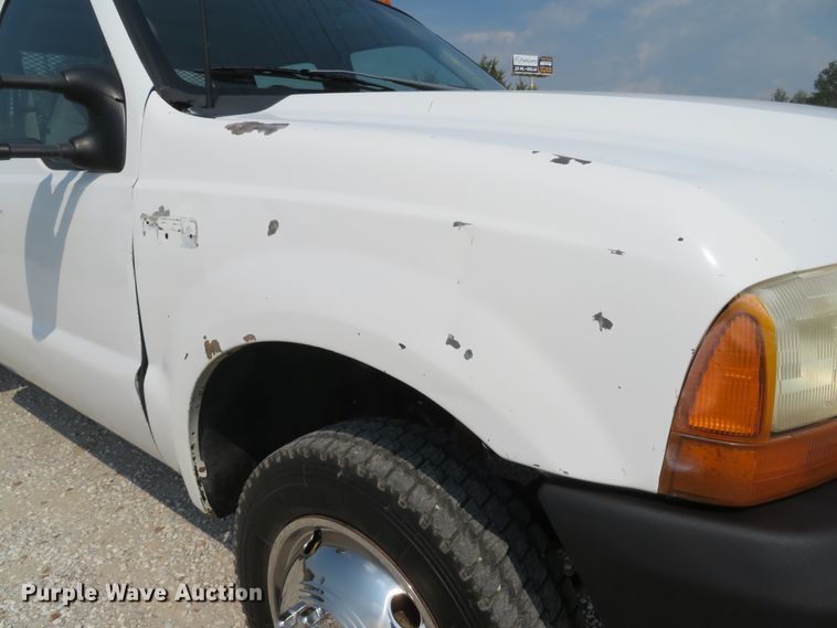 image for item DH1588 1999 Ford F550 Super Duty Crew Cab flatbed truck