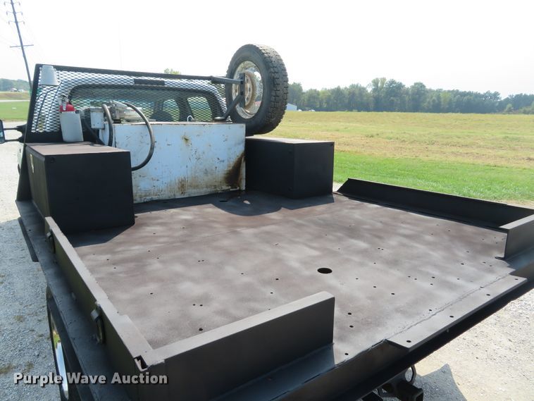 image for item DH1588 1999 Ford F550 Super Duty Crew Cab flatbed truck