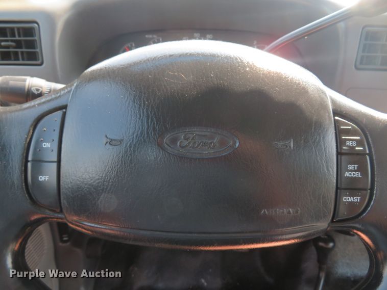 image for item DH1588 1999 Ford F550 Super Duty Crew Cab flatbed truck